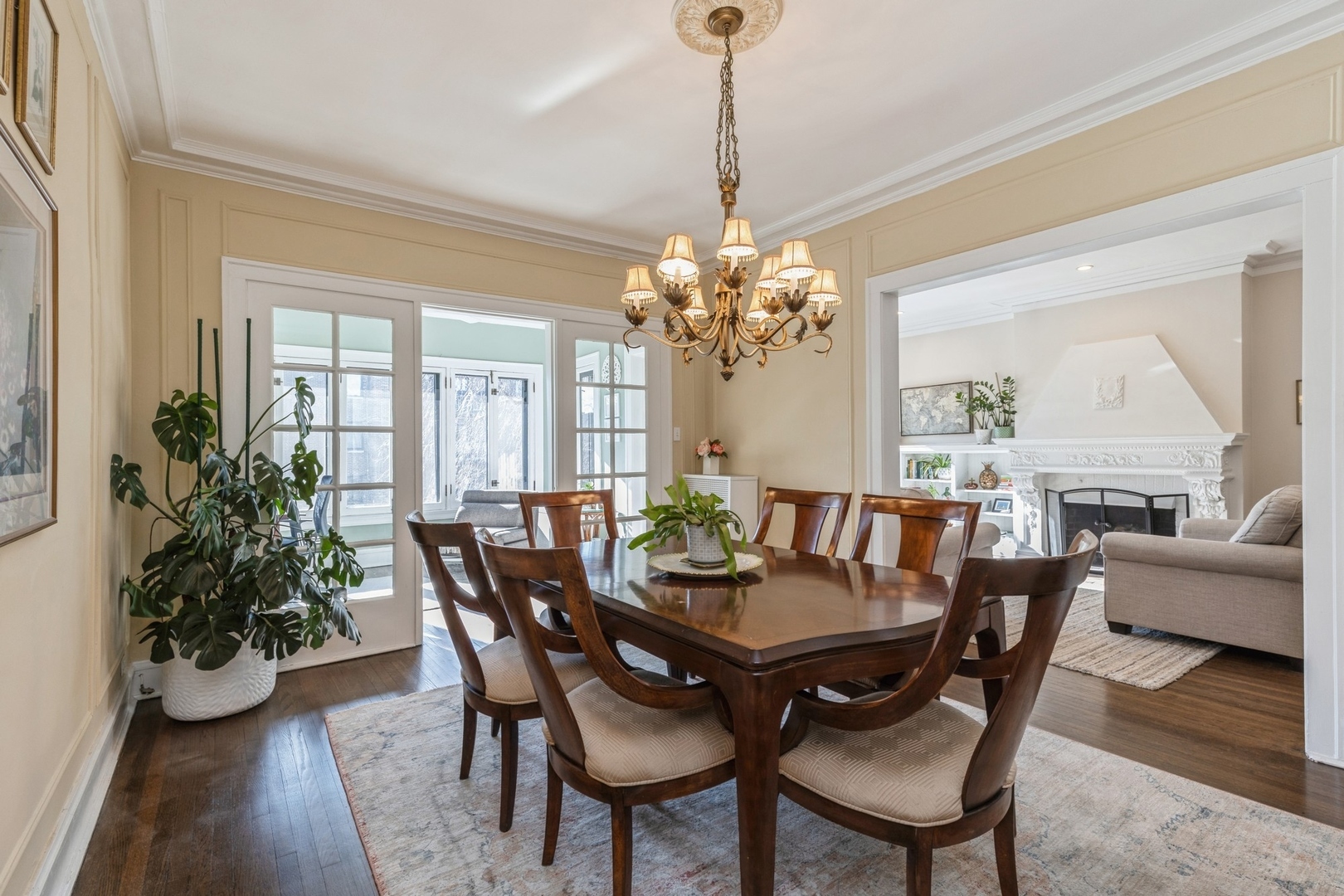 227 Main Street, Unit 3 Evanston, IL 60202 - Photo 5 of 14 a view of a dining room with furniture and a chandelier