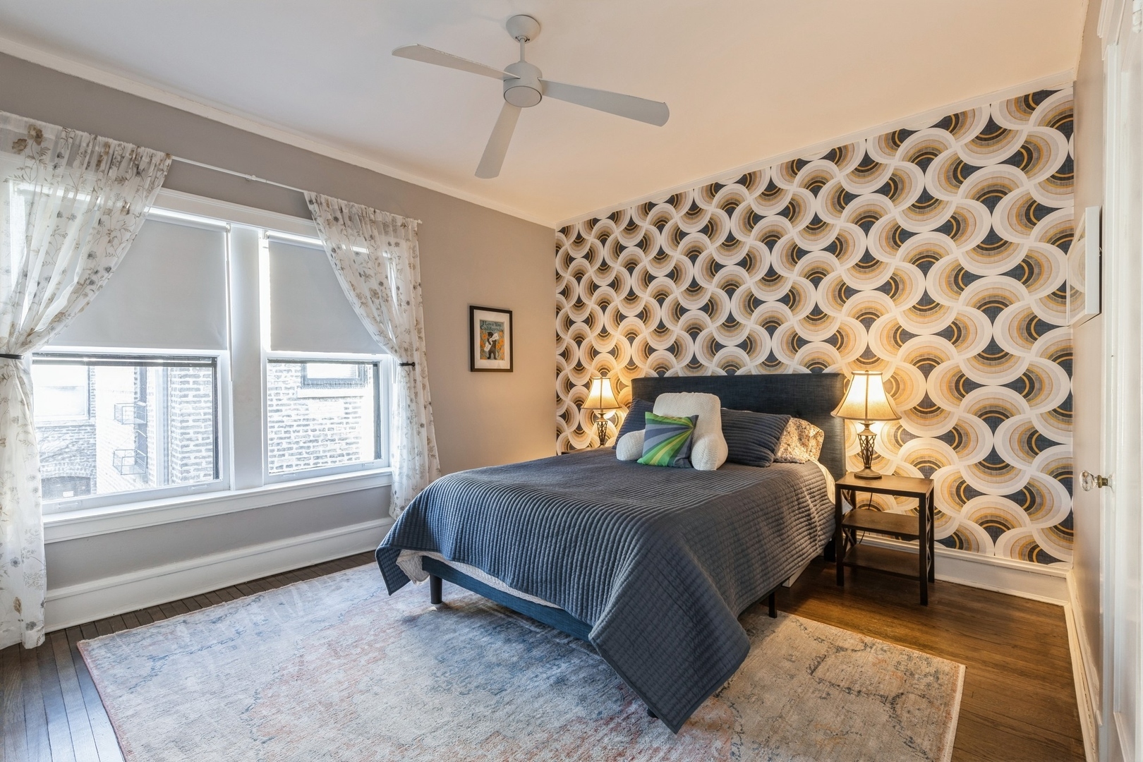 227 Main Street, Unit 3 Evanston, IL 60202 - Photo 8 of 14 a bedroom with a bed and a window