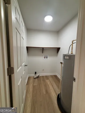 a view of wooden floor in an empty room