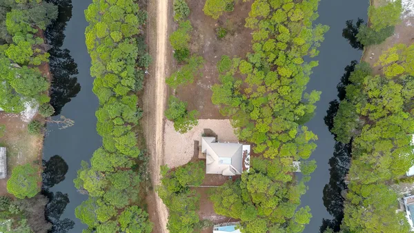 $649,900 | 27 Harry Morrison Road, Alligator Point, FL 32346