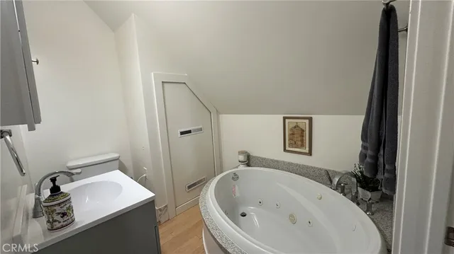 a bathroom with a sink and mirror