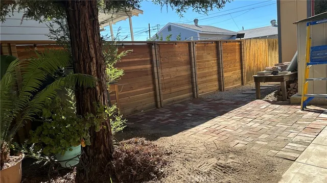 a view of a backyard of the house