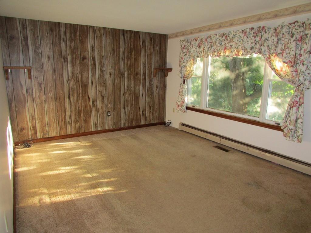 63 West Merrill Road Topsham, ME 04086 - Photo 11 of 32 Living room offers a large picture...