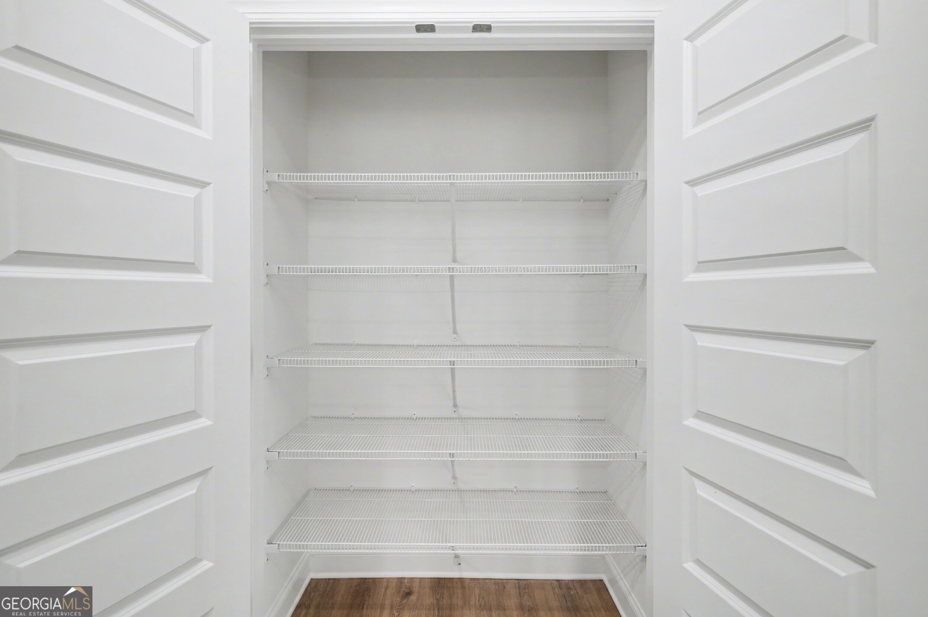2365 New Hope Road Locust Grove, GA 30248 - Photo 17 of 44 a view of an empty walk in closet