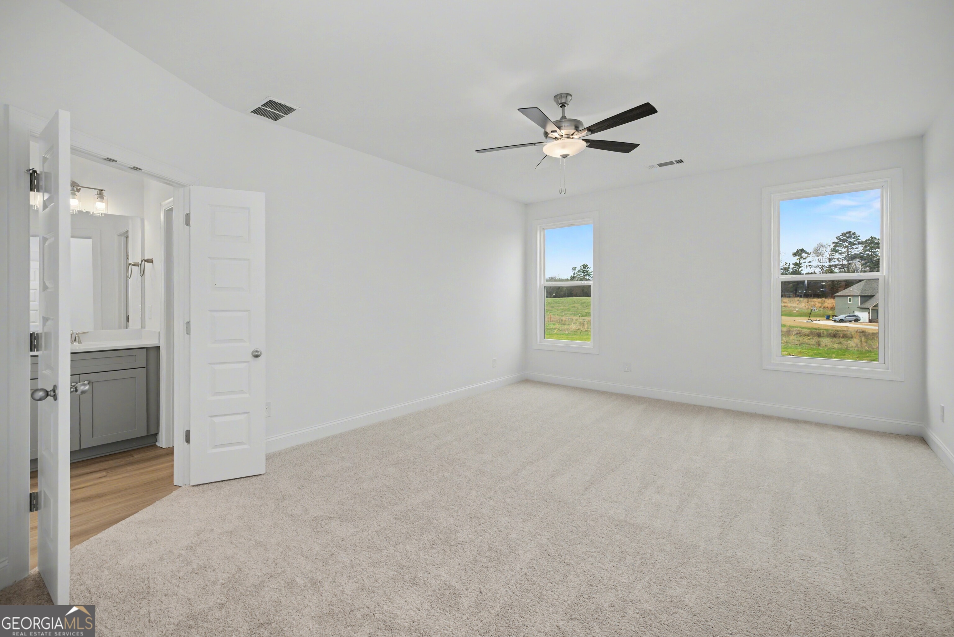 2365 New Hope Road Locust Grove, GA 30248 - Photo 23 of 44 a view of an empty room with a window