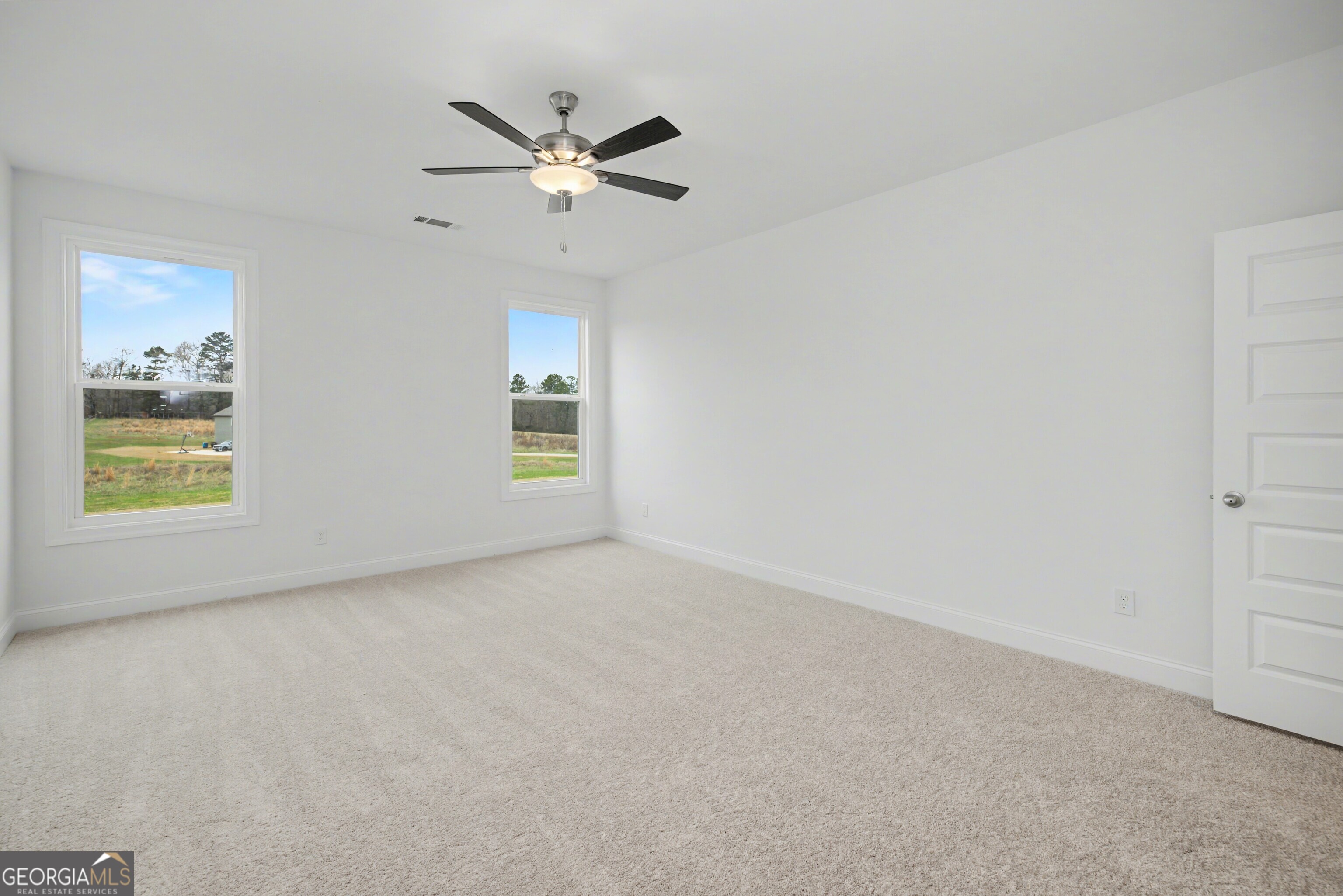 2365 New Hope Road Locust Grove, GA 30248 - Photo 25 of 44 a view of an empty room with a window