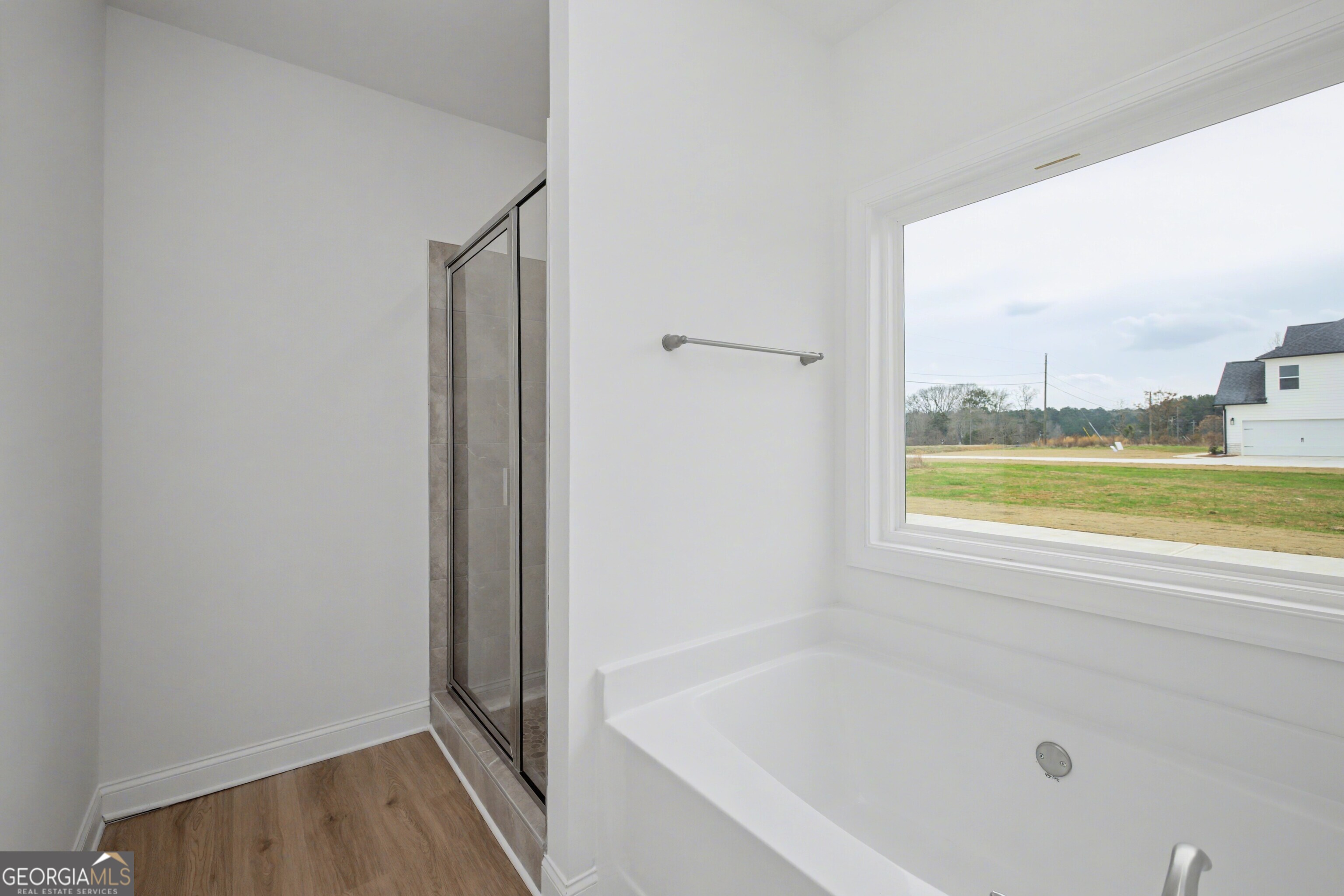 2365 New Hope Road Locust Grove, GA 30248 - Photo 27 of 44 a bathroom with a bathtub
