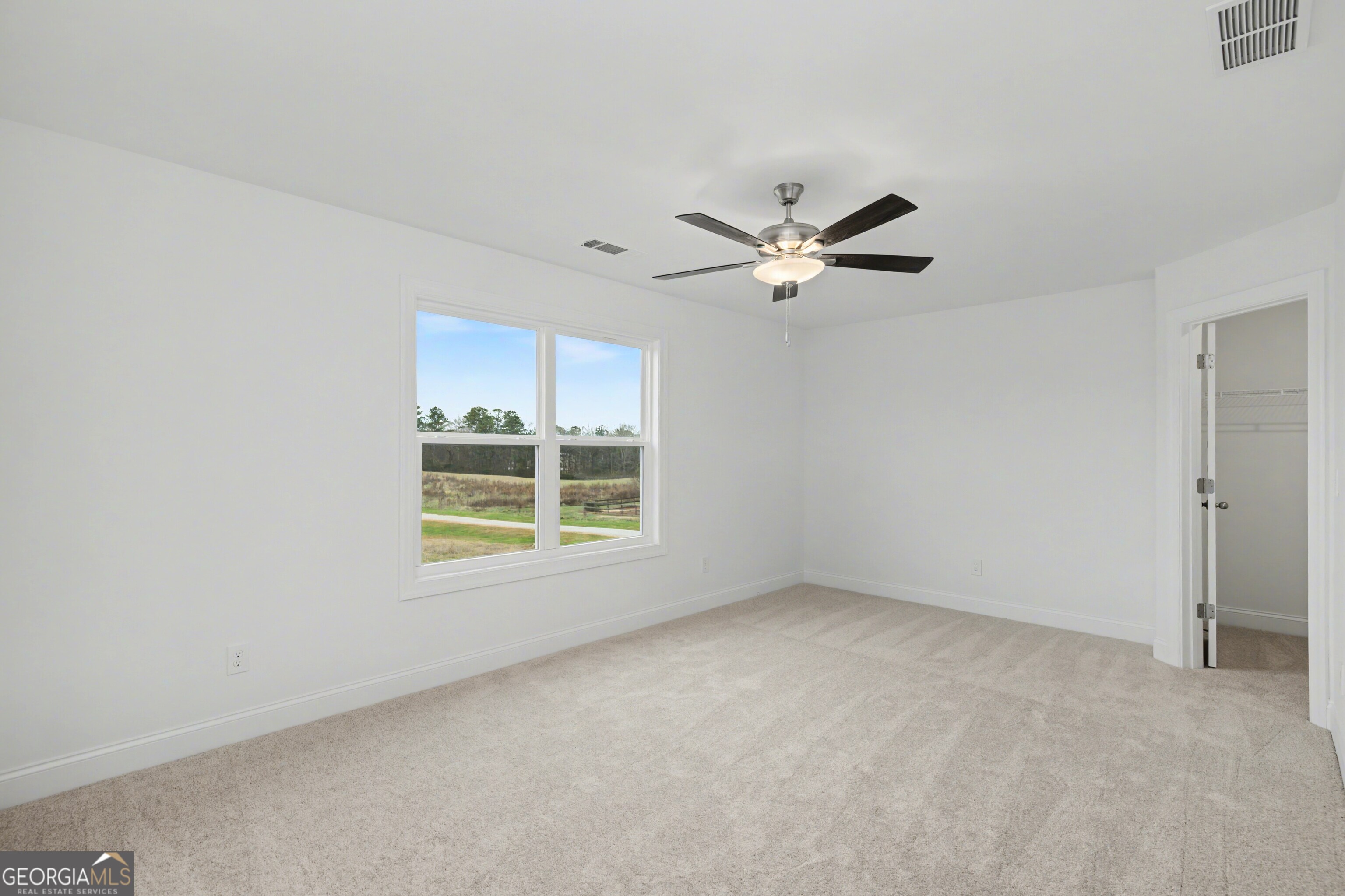 2365 New Hope Road Locust Grove, GA 30248 - Photo 32 of 44 an empty room with a window