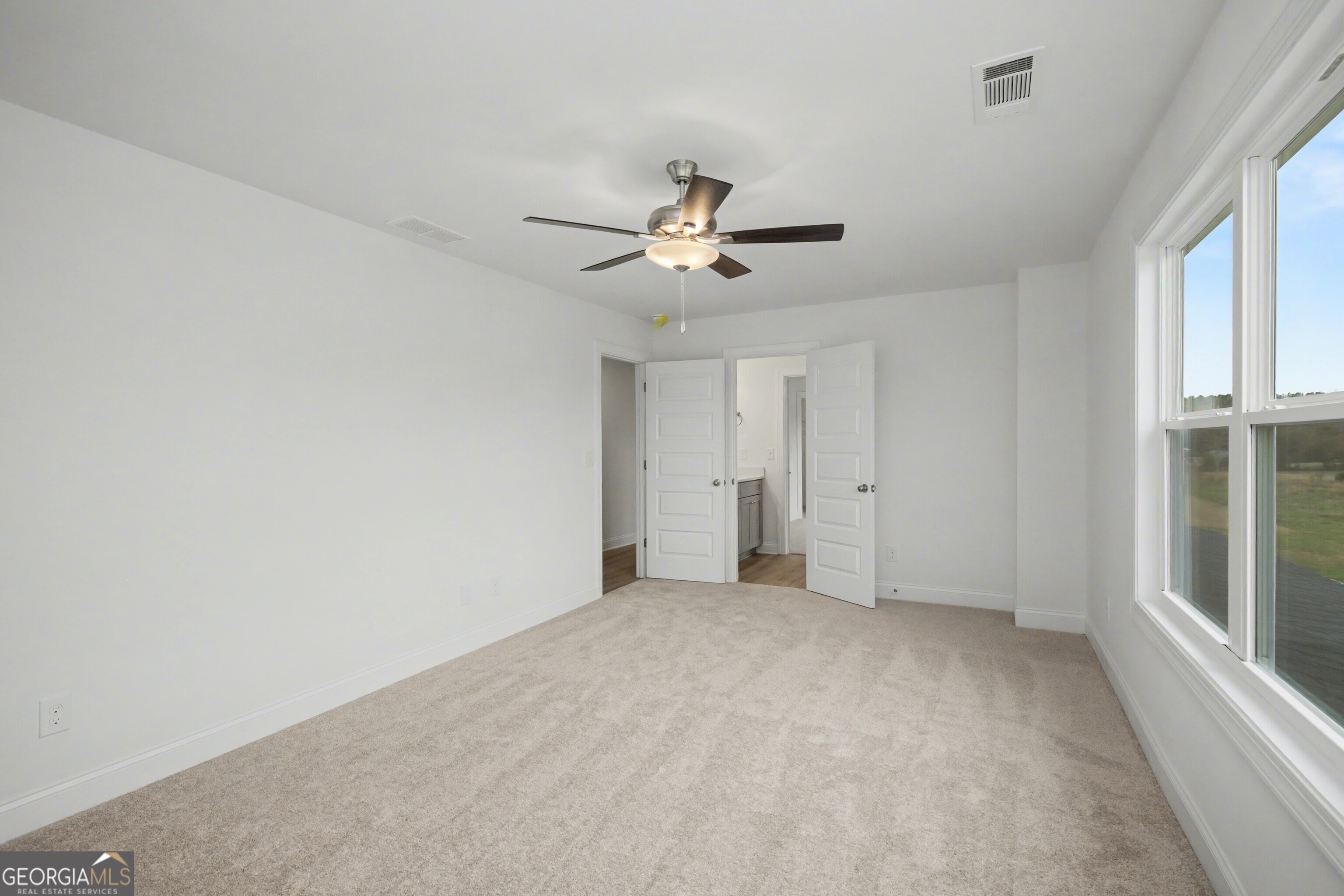 2365 New Hope Road Locust Grove, GA 30248 - Photo 33 of 44 a view of an empty room with a window