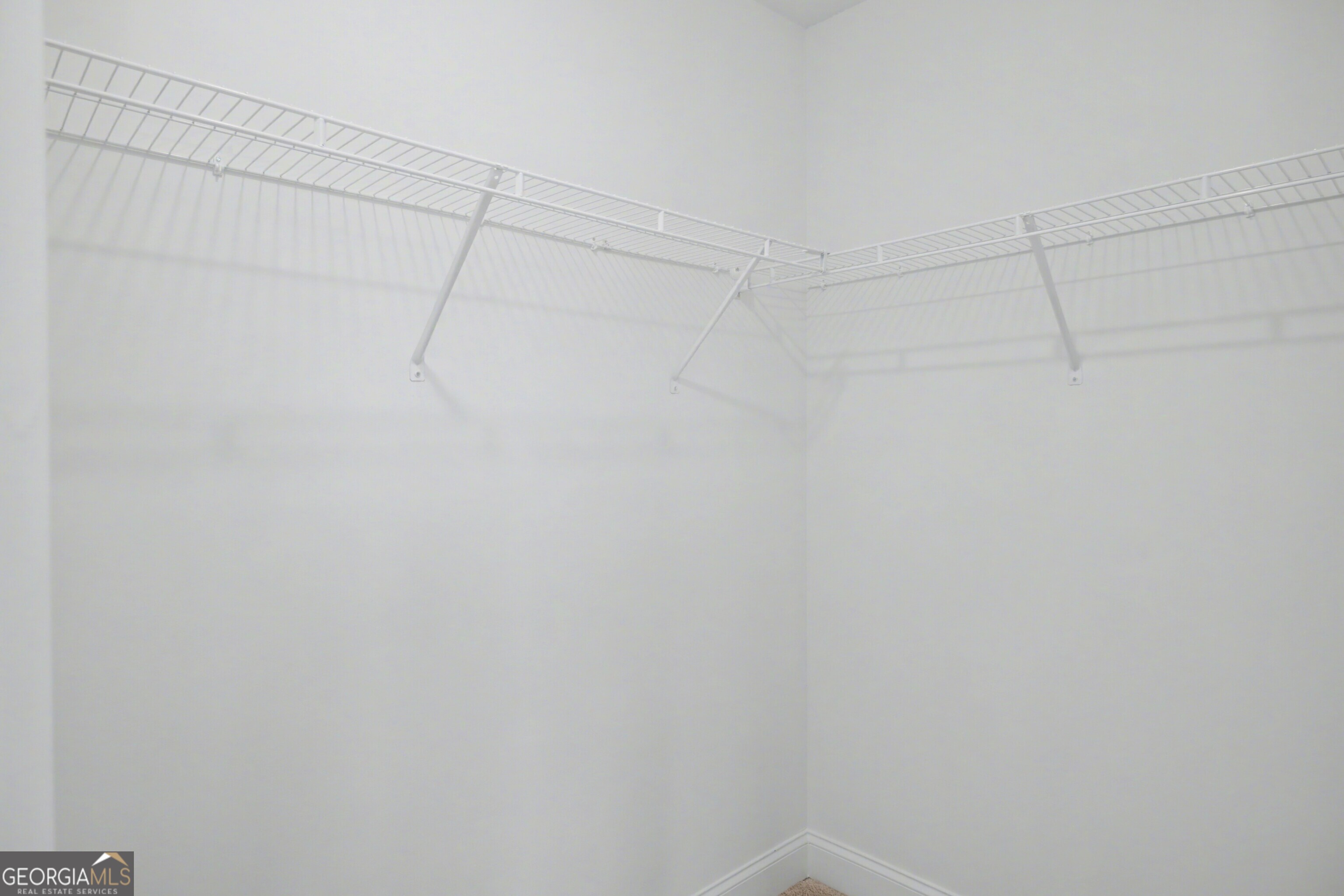 2365 New Hope Road Locust Grove, GA 30248 - Photo 39 of 44 a view of a room with racks on the wall