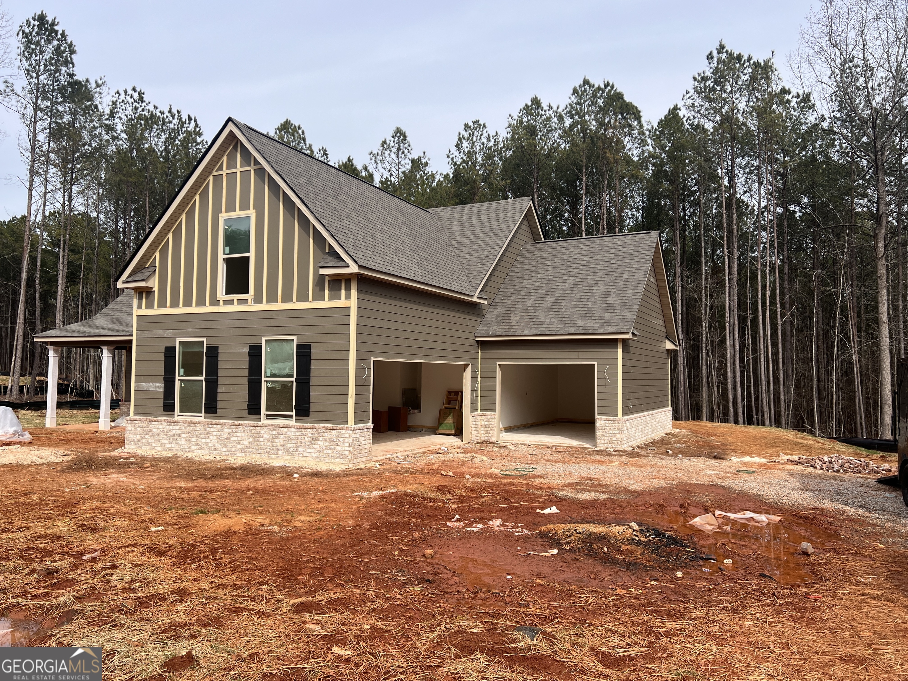 2365 New Hope Road Locust Grove, GA 30248 - Photo 4 of 44 a front view of a house with a yard