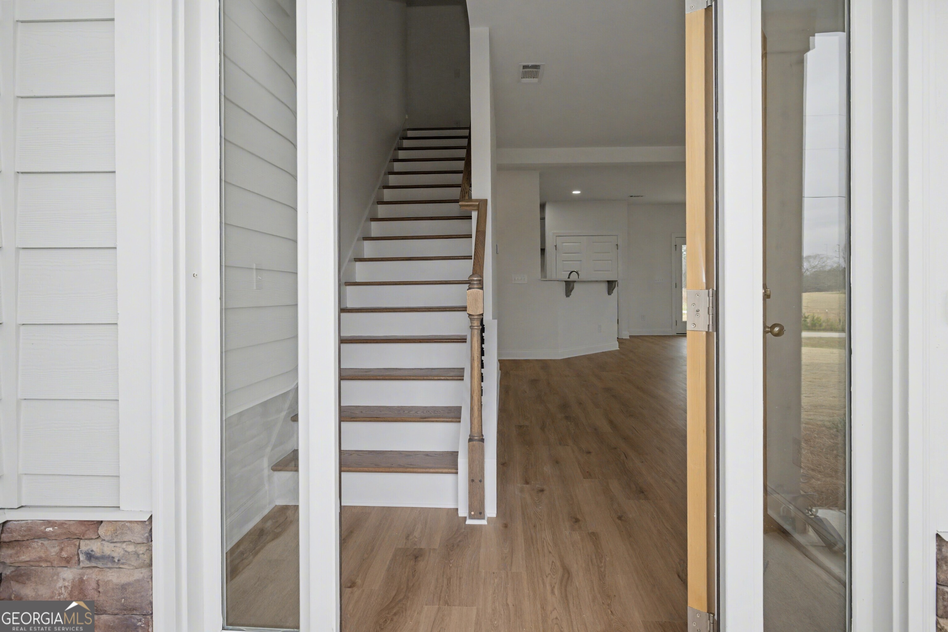2365 New Hope Road Locust Grove, GA 30248 - Photo 8 of 44 a view of entryway with wooden floor