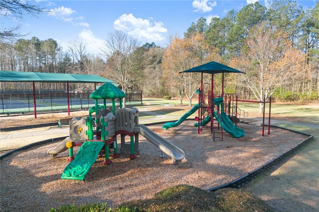 6229 Grand Loop Road Sugar Hill, GA 30518 - Photo 87 of 93 a view of a park with slide