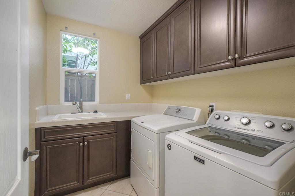 1789 Lemon Tree Court San Marcos, CA 92078 - Photo 13 of 34 a utility room with dryer and washer