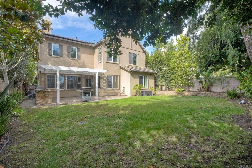 1789 Lemon Tree Court San Marcos, CA 92078 - Photo 23 of 34 front view of a house with a yard