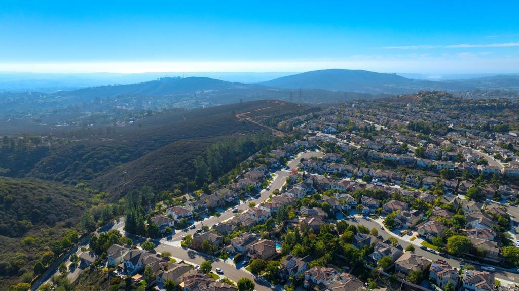1789 Lemon Tree Court San Marcos, CA 92078 - Photo 31 of 34 an aerial view of residential houses with outdoor space and trees