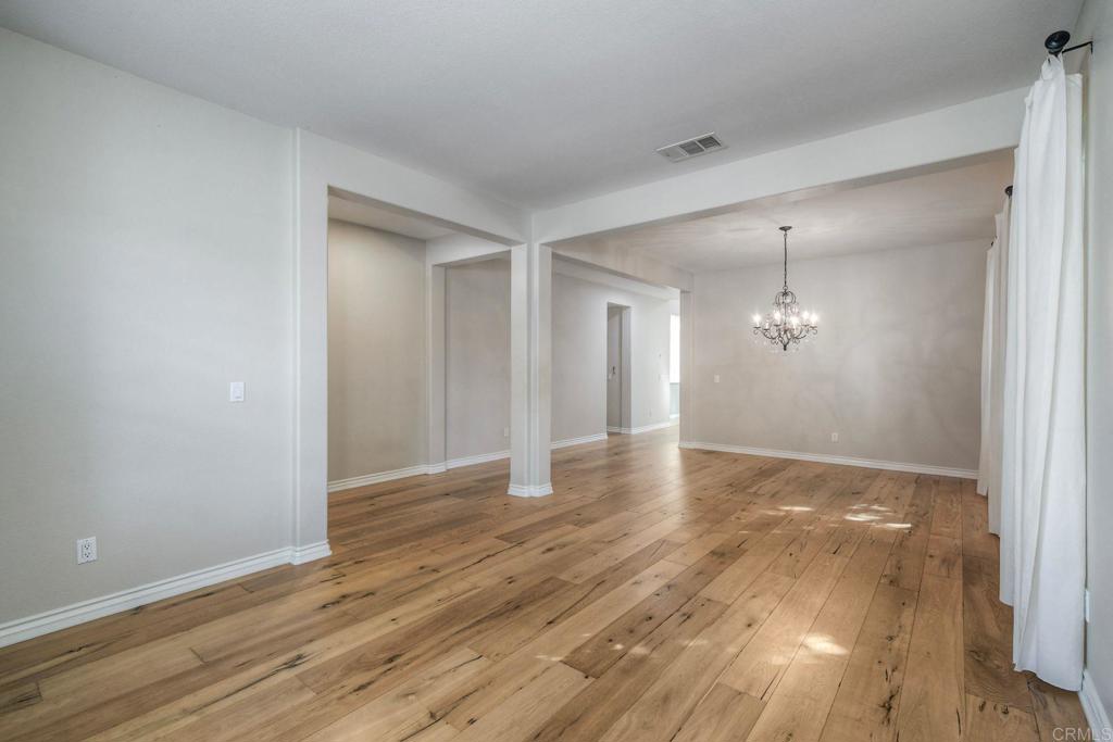 1789 Lemon Tree Court San Marcos, CA 92078 - Photo 5 of 34 a view of empty room with wooden floor