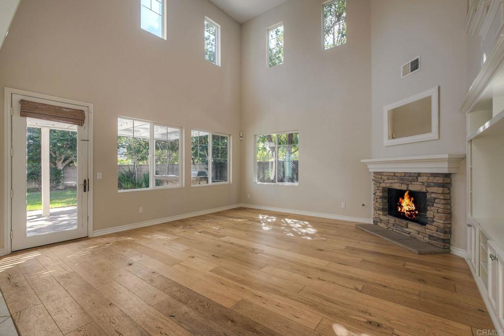 1789 Lemon Tree Court San Marcos, CA 92078 - Photo 6 of 34 a view of an empty room with a window and fireplace
