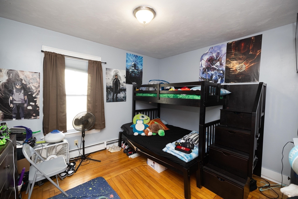 700 Franklin Street Worcester, MA 01604 - Photo 14 of 24 a living room with furniture and a flat screen tv