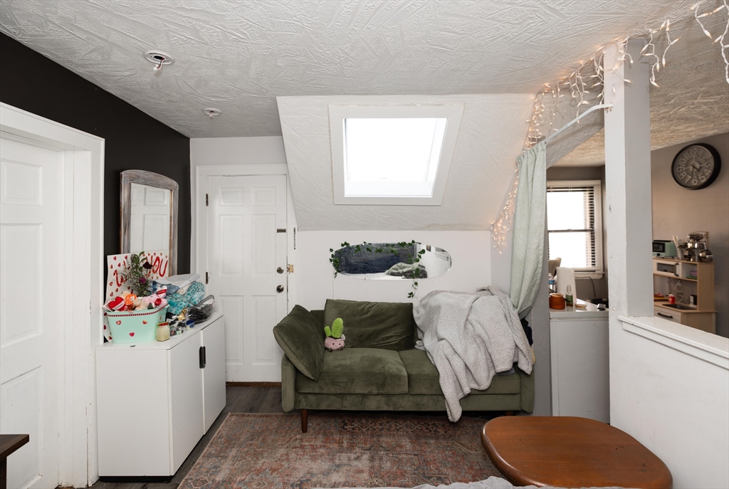 700 Franklin Street Worcester, MA 01604 - Photo 18 of 24 a bedroom with furniture and a window