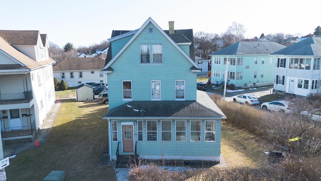 700 Franklin Street Worcester, MA 01604 - Photo 23 of 24 a front view of a house with a yard