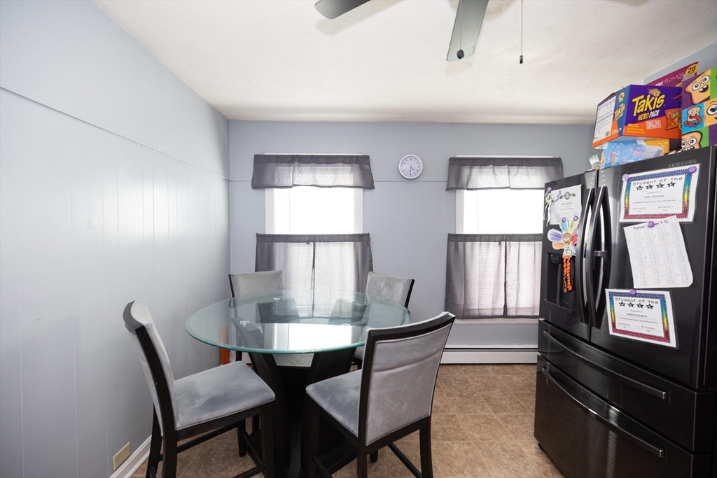 700 Franklin Street Worcester, MA 01604 - Photo 10 of 24 a view of a dining room with furniture and a window