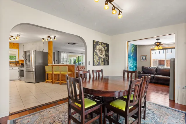 a view of a dining room with furniture
