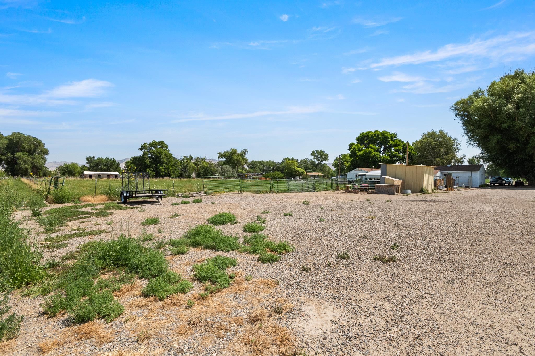 665-30 30 1/2 Road Grand Junction, CO 81504 - Photo 37 of 38 a view of a road with a building in the background