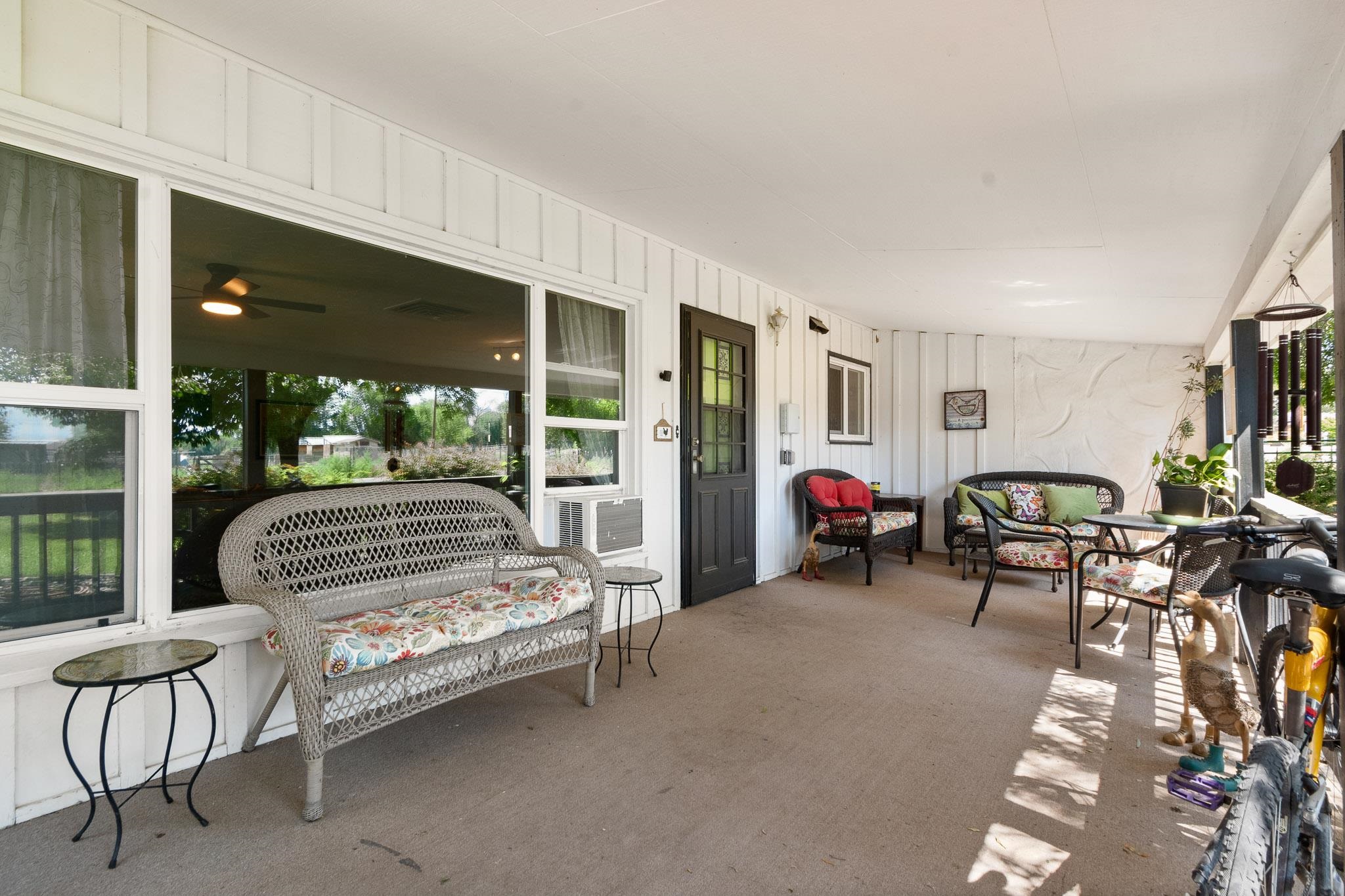 665-30 30 1/2 Road Grand Junction, CO 81504 - Photo 5 of 38 a bedroom with furniture and a large window