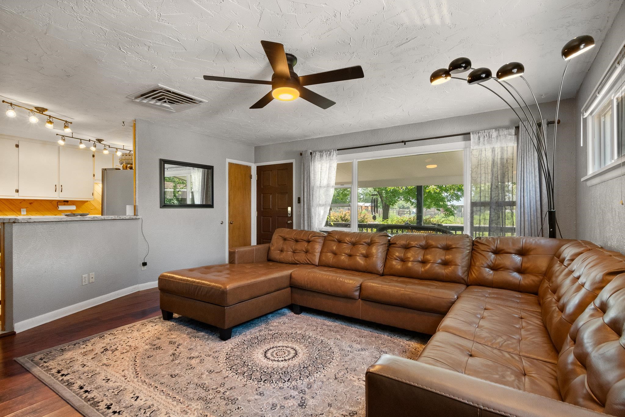 665-30 30 1/2 Road Grand Junction, CO 81504 - Photo 6 of 38 a living room with furniture and a large window