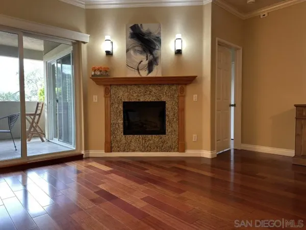 a view of room with hardwood floor