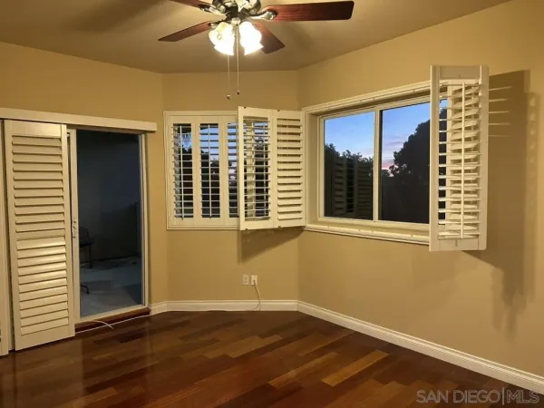 a bathroom with a toilet a sink and shower