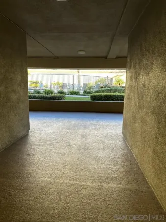 a view of an empty room with a couch