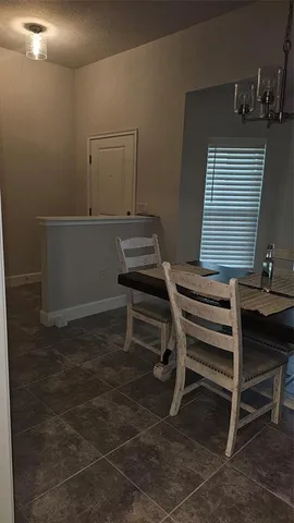 a view of a workspace with furniture