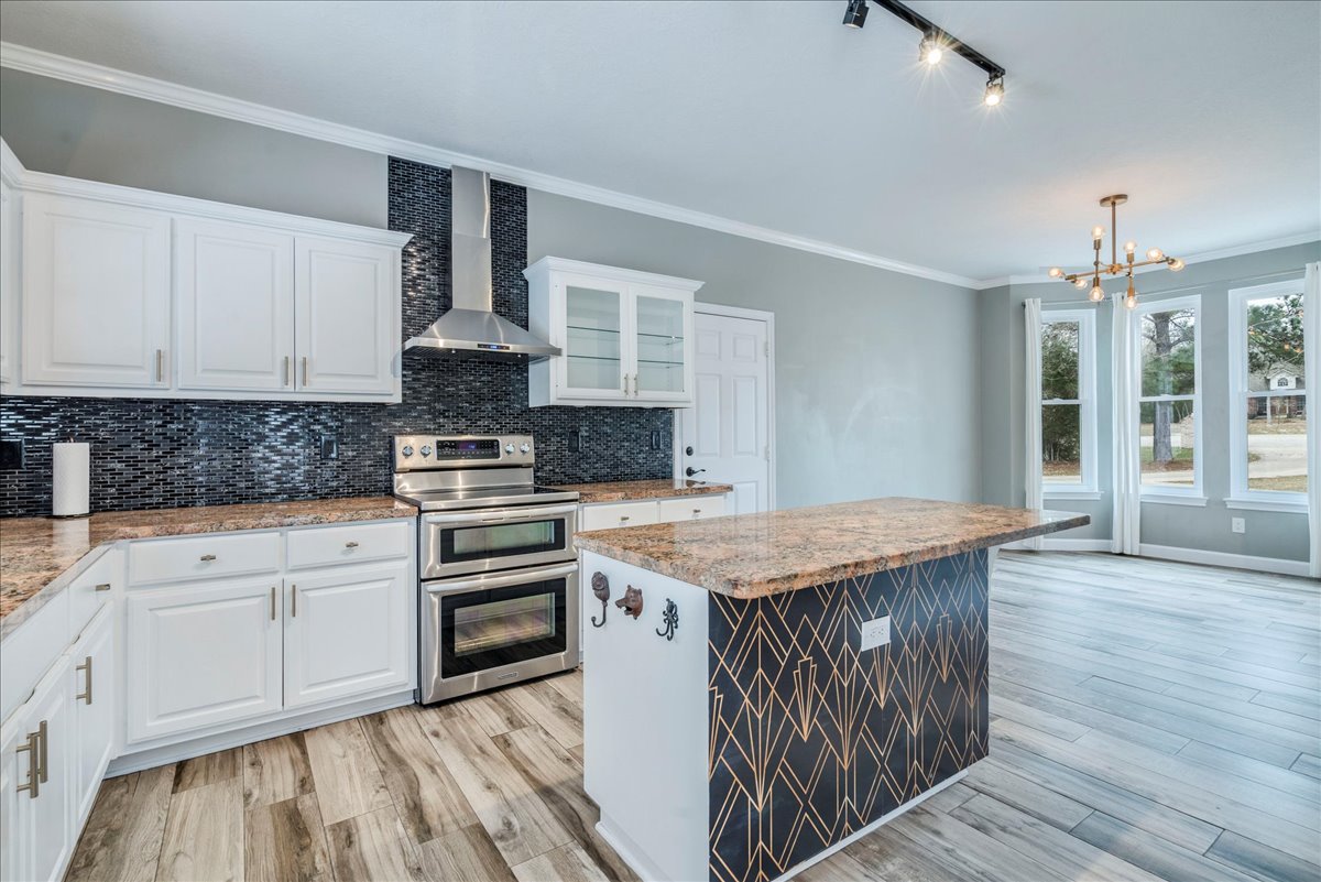 171 Pin Oak Crossing Elgin, TX 78621 - Photo 17 of 39 Unfurnished kitchen & dining area