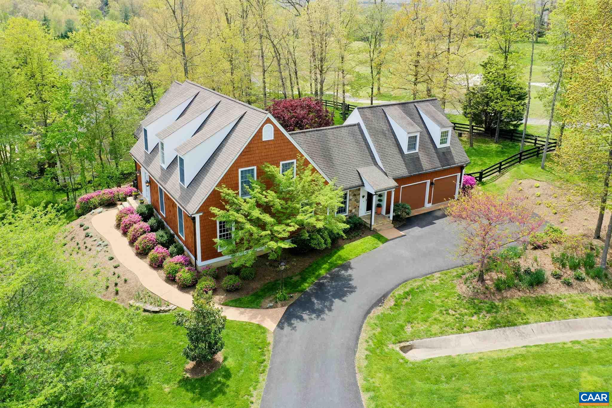 3315 Darby Road Keswick, VA 22947 - Photo 1 of 67 an aerial view of a house with a garden and trees