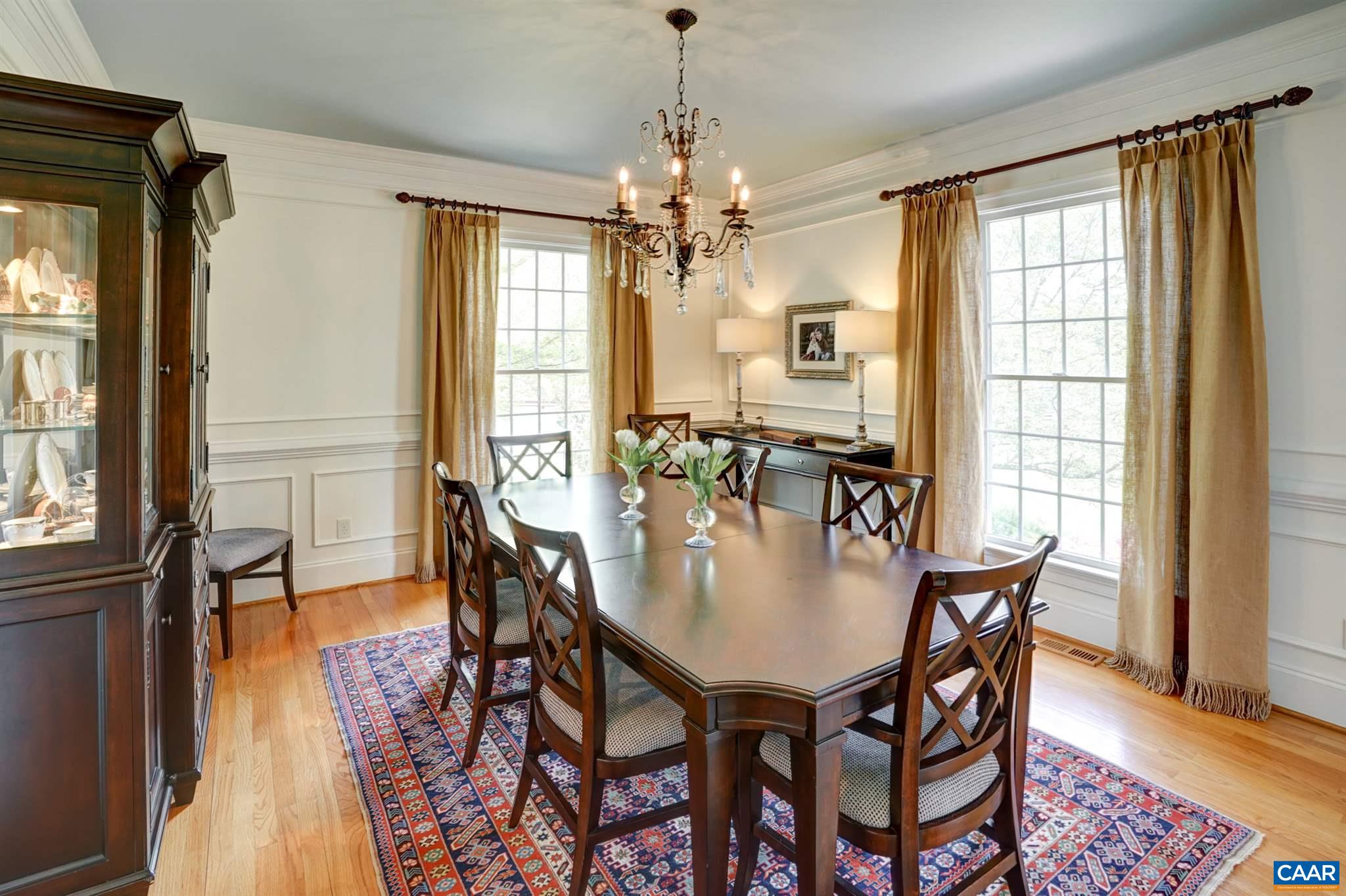 3315 Darby Road Keswick, VA 22947 - Photo 16 of 67 a view of a dining room with furniture window and wooden floor