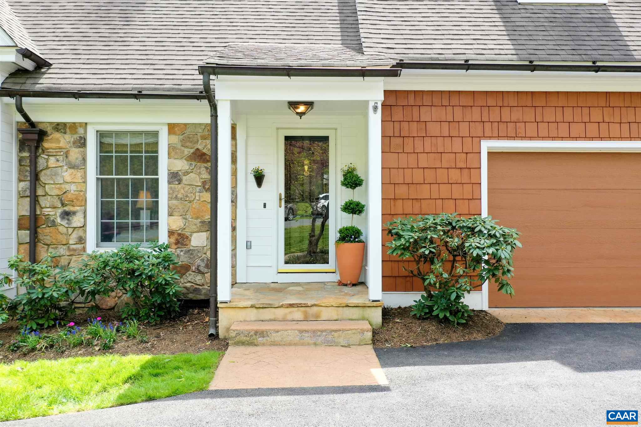 3315 Darby Road Keswick, VA 22947 - Photo 48 of 67 a front view of a house with garden