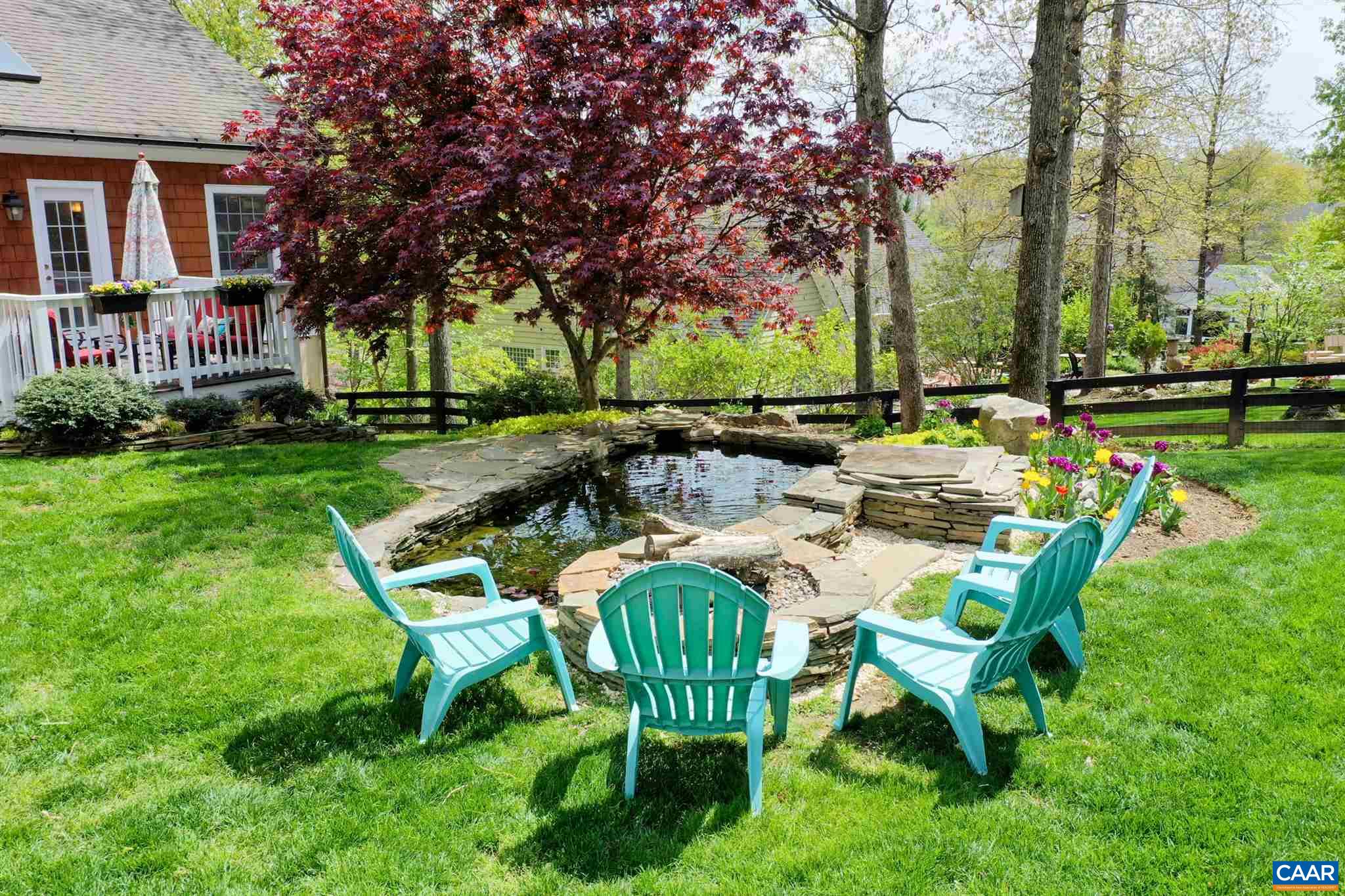 3315 Darby Road Keswick, VA 22947 - Photo 55 of 67 a view of a chairs and table in backyard of the house