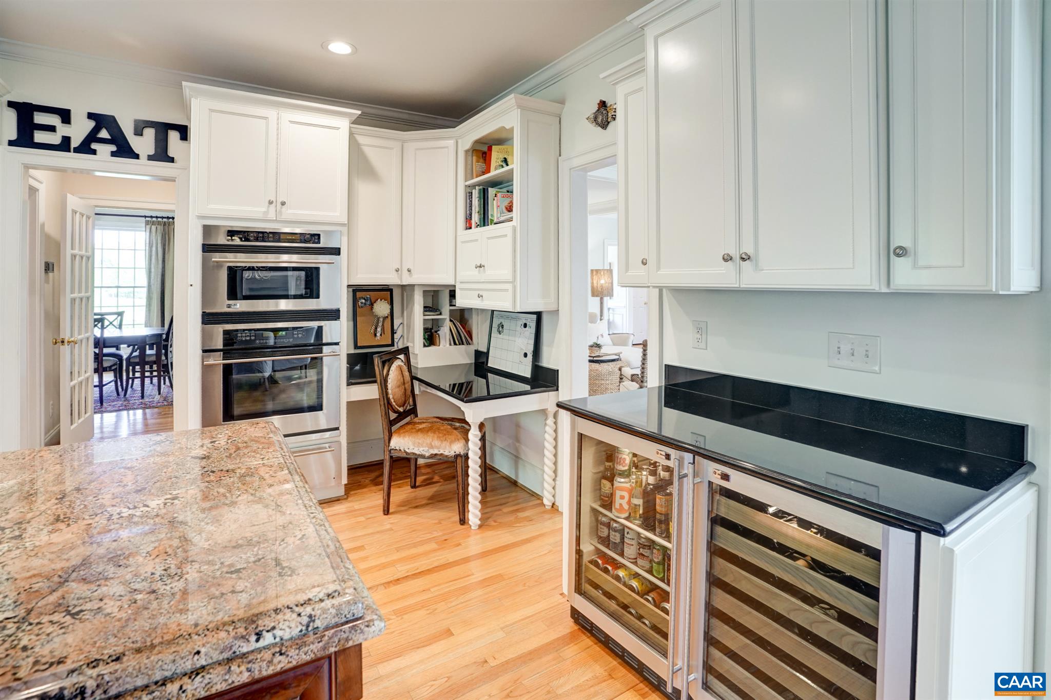 3315 Darby Road Keswick, VA 22947 - Photo 6 of 67 a kitchen with stainless steel appliances kitchen island granite countertop a stove and a refrigerator