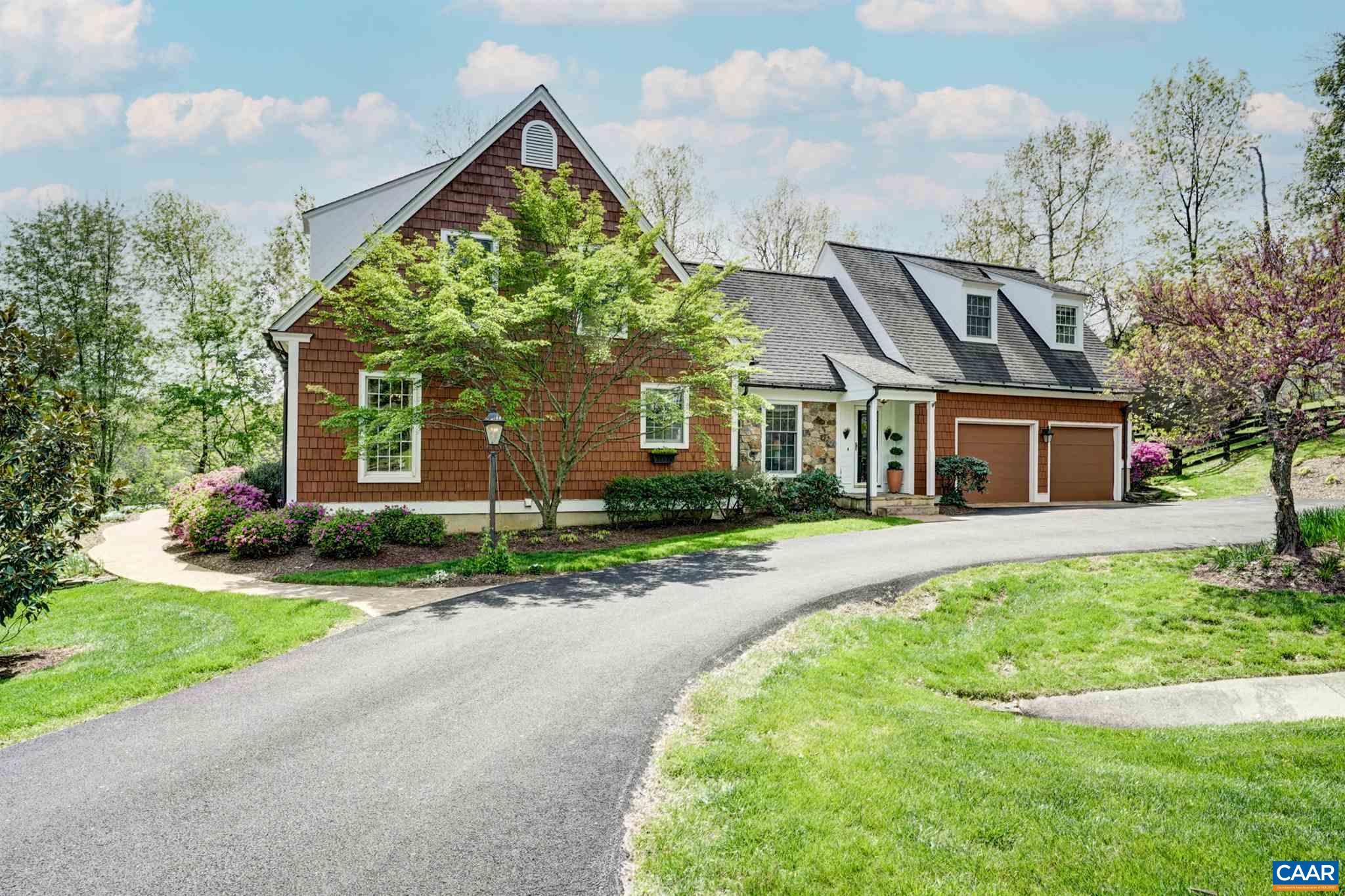 3315 Darby Road Keswick, VA 22947 - Photo 66 of 67 a front view of a house with a yard and garage