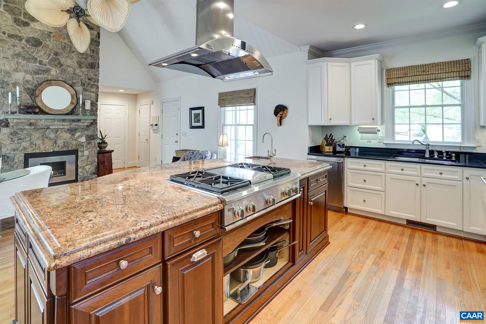 3315 Darby Road Keswick, VA 22947 - Photo 8 of 67 a kitchen with a stove sink and cabinets