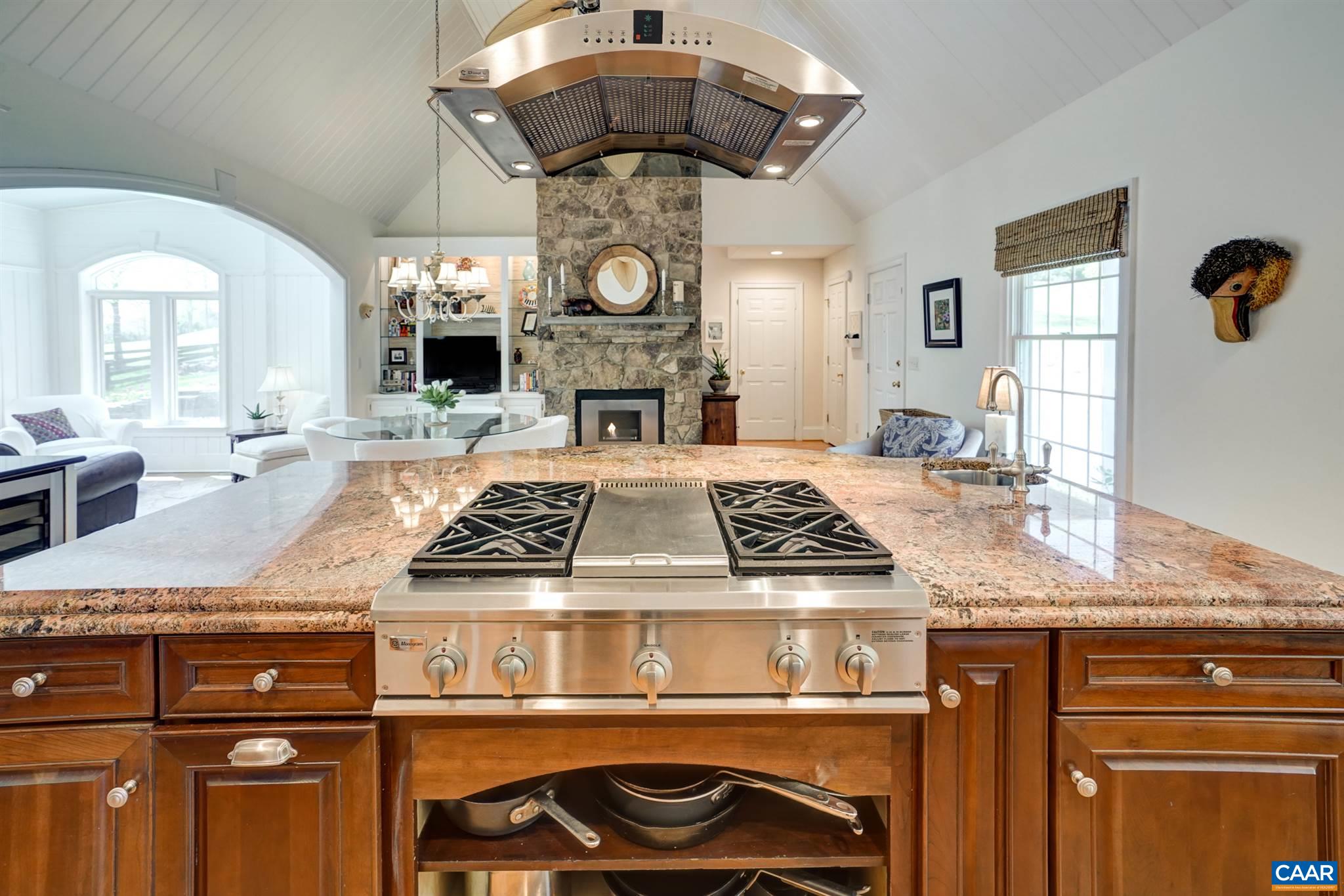 3315 Darby Road Keswick, VA 22947 - Photo 9 of 67 a kitchen with a stove and a clock