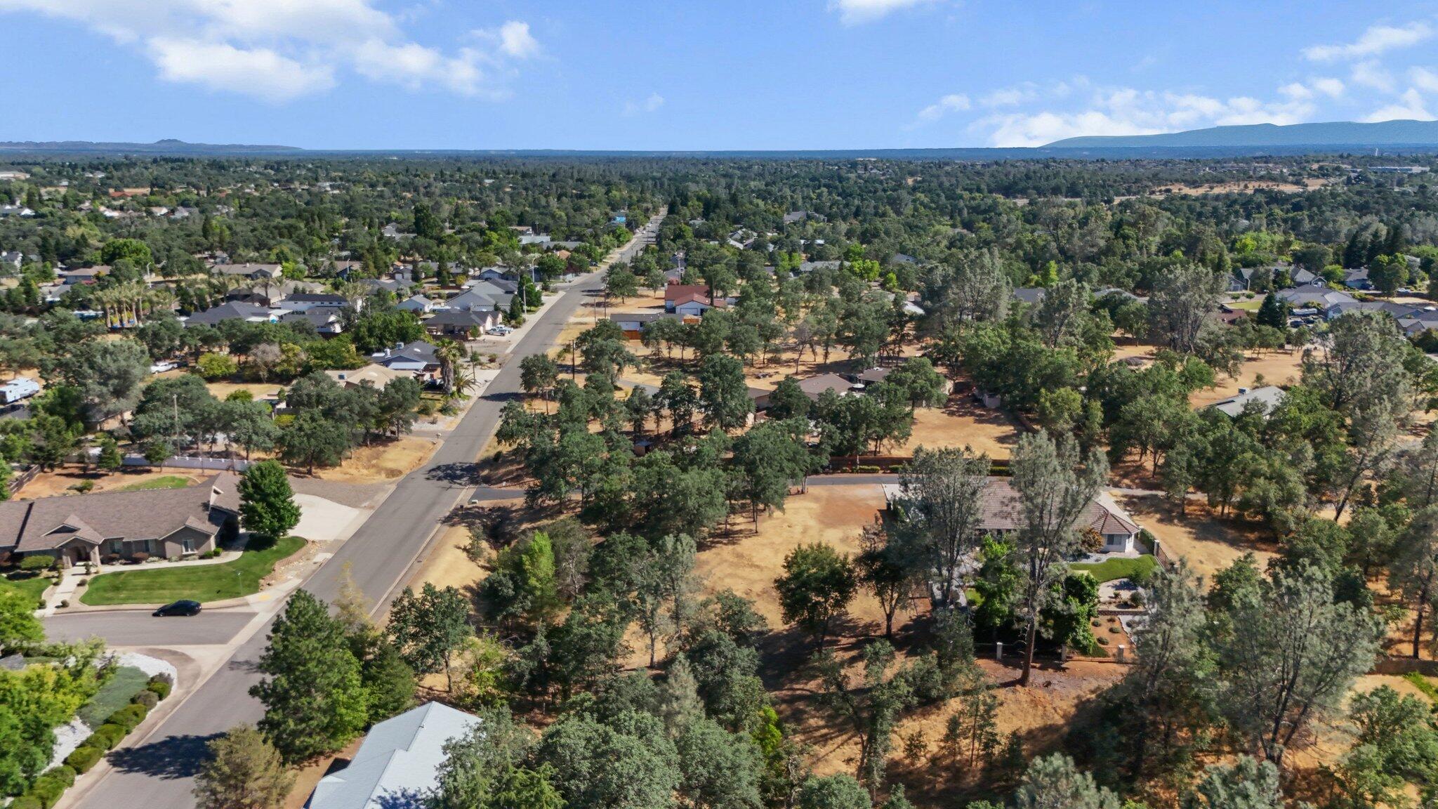 11632 Ridgewood Road Redding, CA 96003 - Photo 5 of 15 an aerial view of residential houses with outdoor space and trees