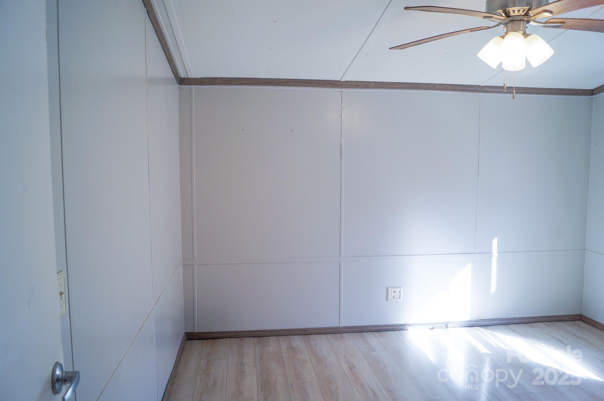 105 Lane Street Morganton, NC 28655 - Photo 15 of 19 a view of an empty room with a window