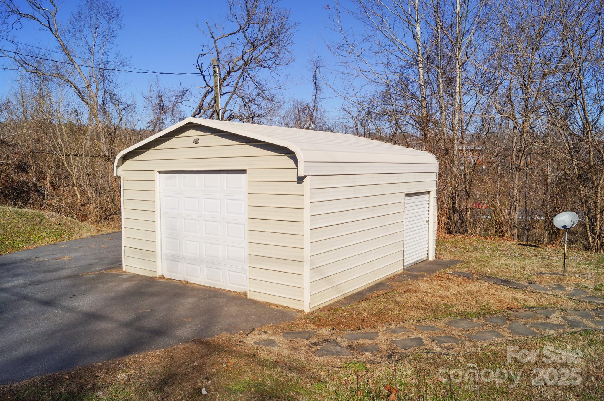 105 Lane Street Morganton, NC 28655 - Photo 7 of 19 a front view of a house with a yard