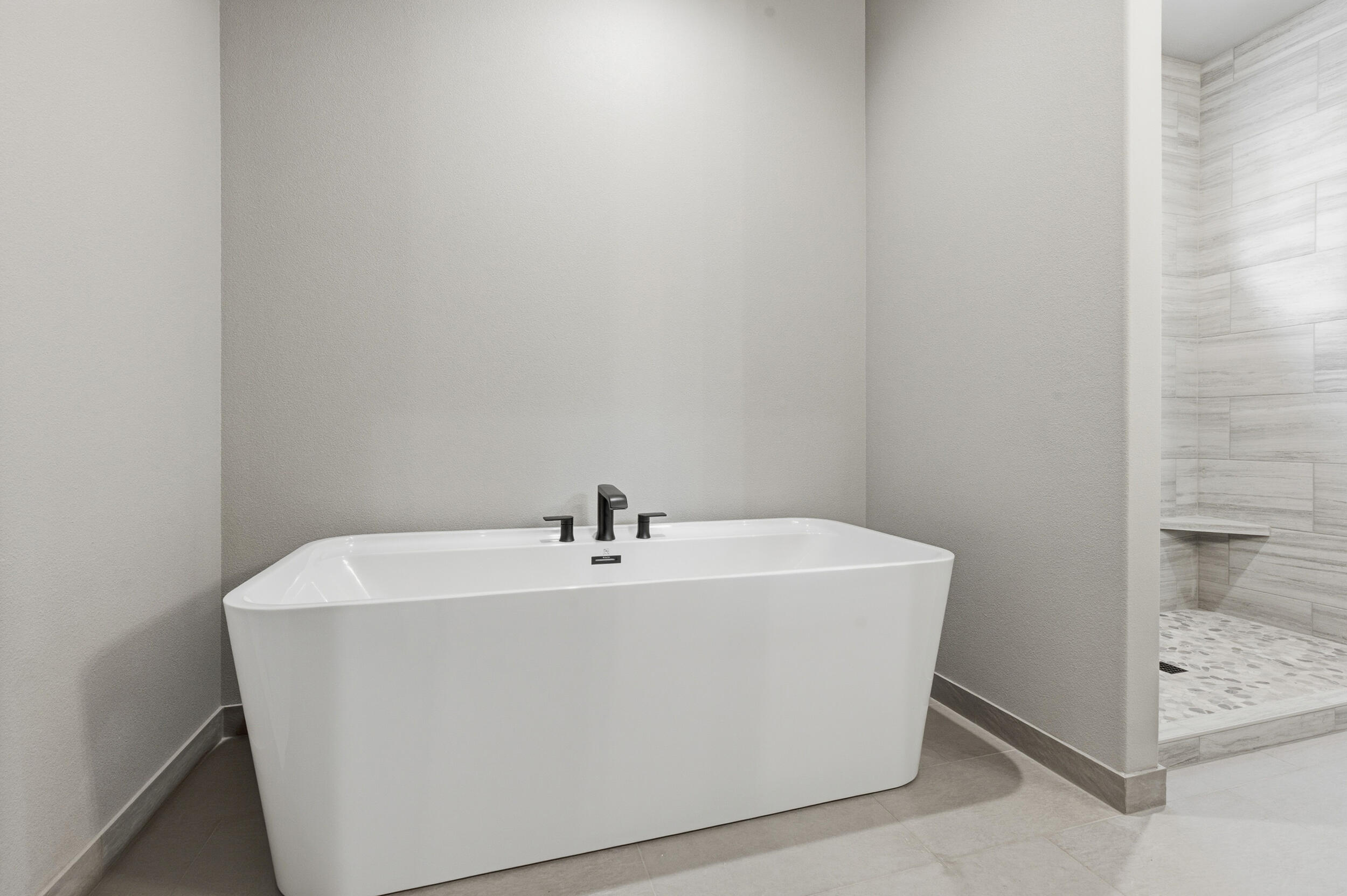 16083 Dyke Road, Unit 9 La Pine, OR 97739 - Photo 22 of 53 a white bath tub sitting in a bathroom
