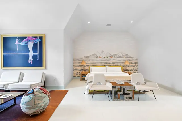 a bathroom with a granite countertop tub a sink and a large window