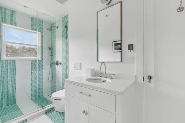 a bed room with a bed and a window