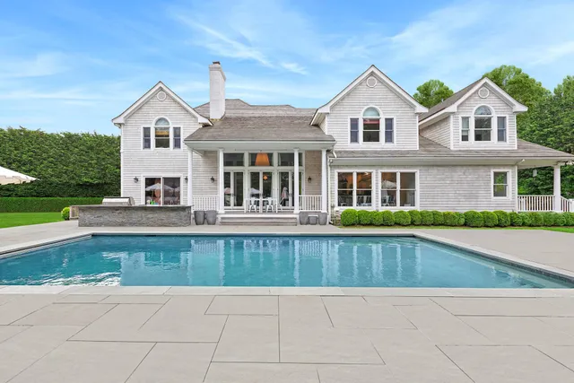 a view of a house with a big yard